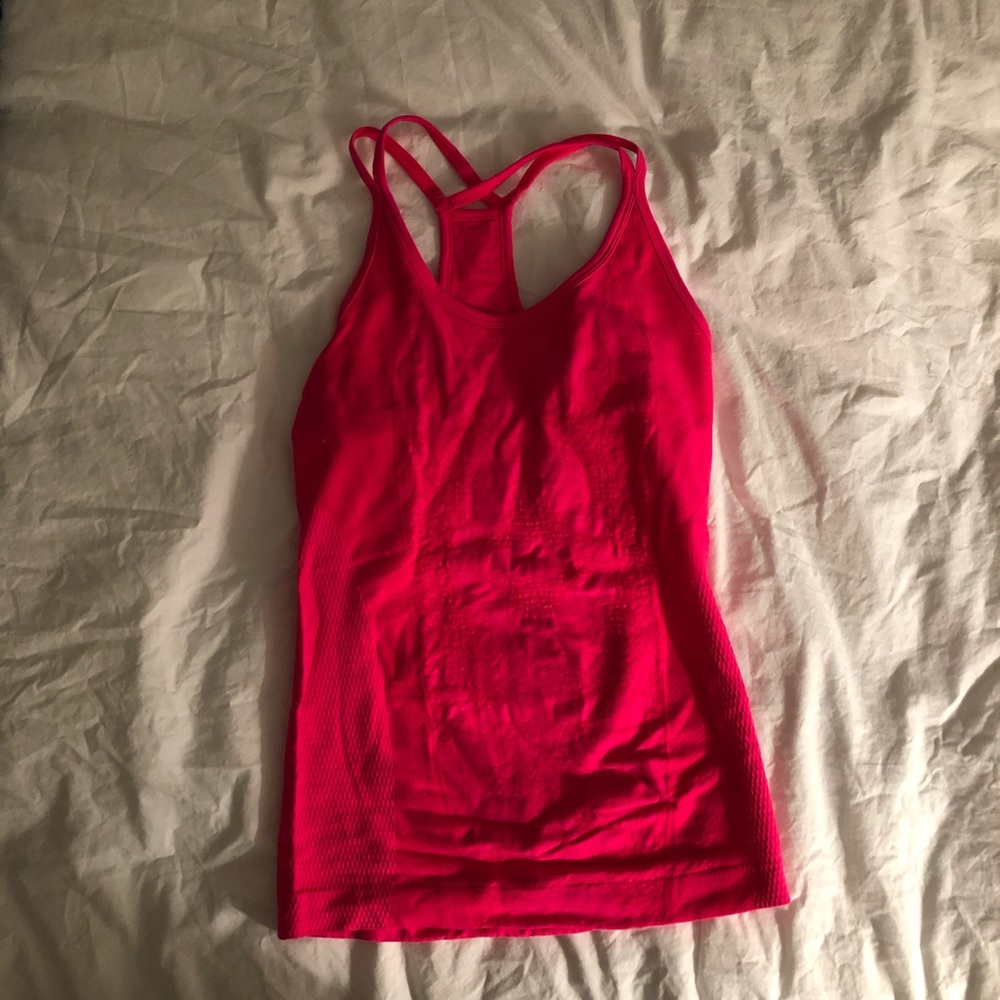 Pink athletic shirt with textured design